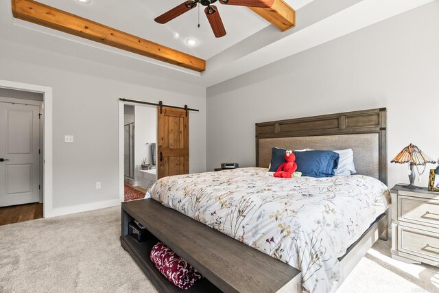bedroom with a barn door, beam ceiling, baseboards, light carpet, and recessed lighting