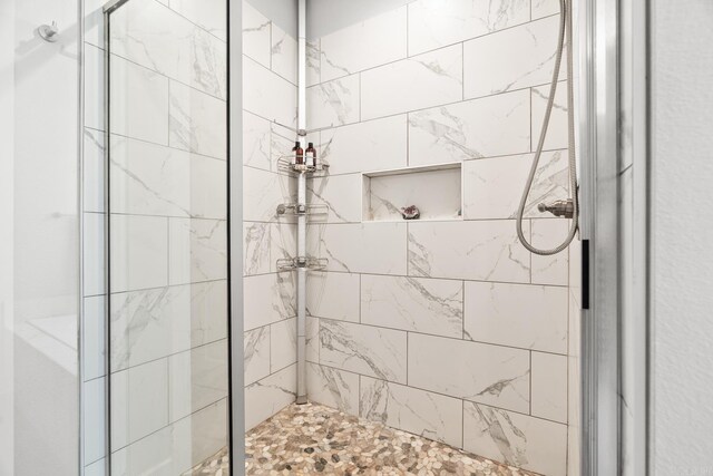 bathroom featuring a stall shower