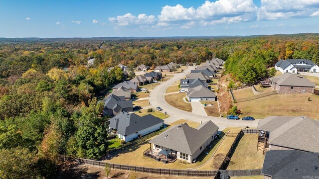 aerial view with a residential view and a wooded view