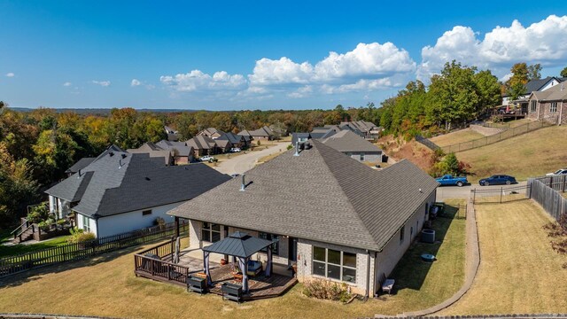 birds eye view of property with a residential view