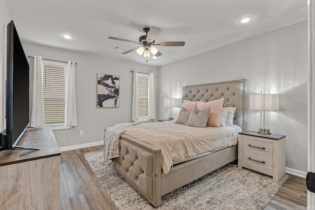 538 Maple St, Trumann, AR 72472 - bedroom featuring visible vents, recessed lighting, baseboards, and wood finished floors