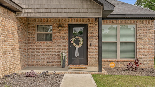 538 Maple St, Trumann, AR 72472 - doorway to property featuring brick siding