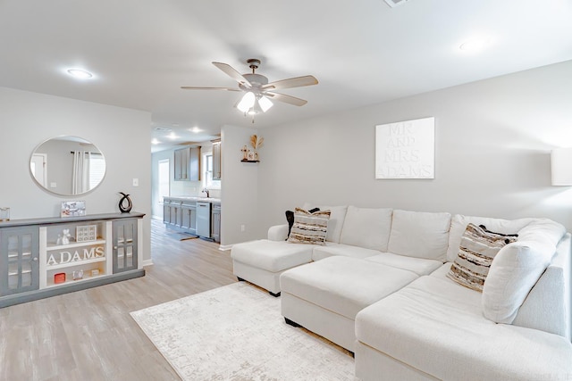 538 Maple St, Trumann, AR 72472 - living area with baseboards, a ceiling fan, recessed lighting, and light wood-style flooring