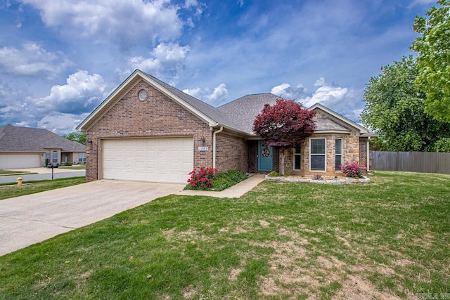 single story home with fence, a front yard, brick siding, concrete driveway, and an attached garage