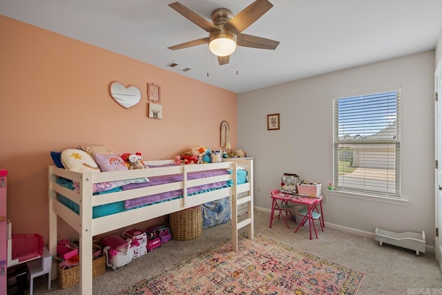 bedroom with baseboards, ceiling fan, carpet flooring, and visible vents