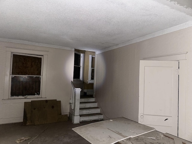2211 W 17th St, Little Rock, AR 72202 - staircase with a textured ceiling
