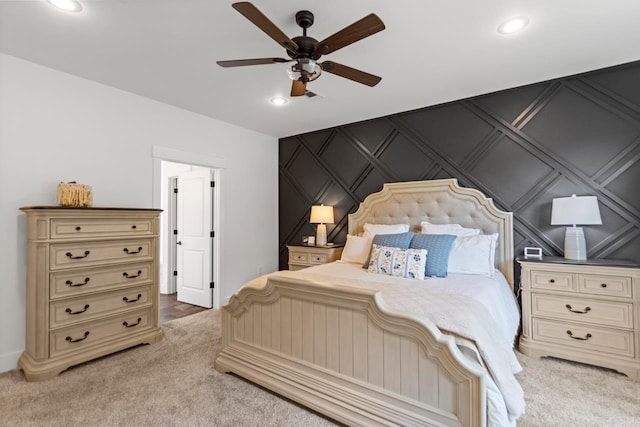 bedroom featuring recessed lighting, ceiling fan, and light carpet