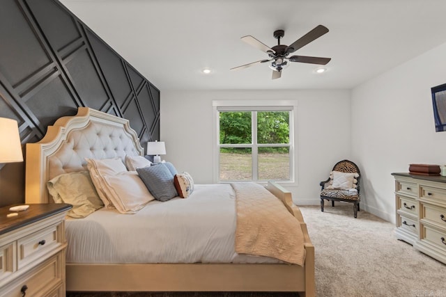 bedroom with recessed lighting, ceiling fan, light carpet, and baseboards