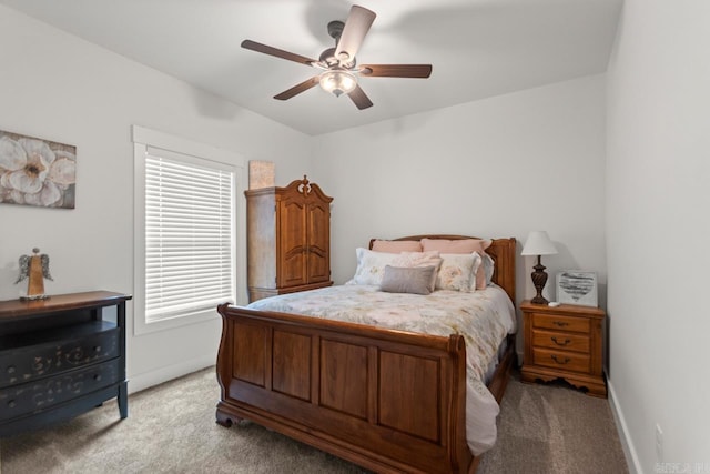 bedroom with baseboards, light colored carpet, and ceiling fan
