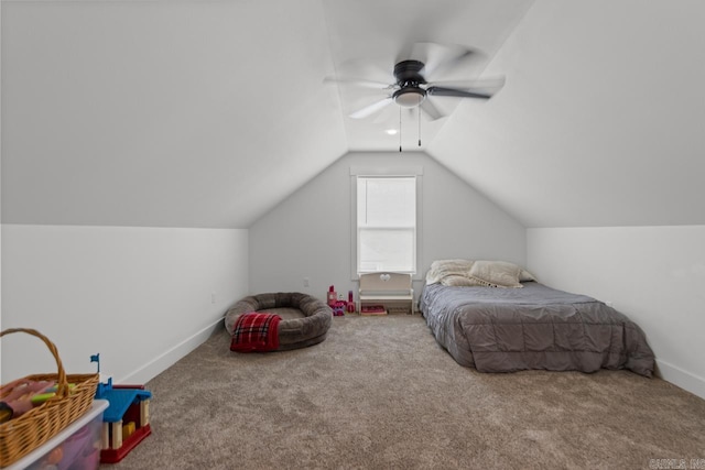 carpeted bedroom featuring baseboards, ceiling fan, and lofted ceiling