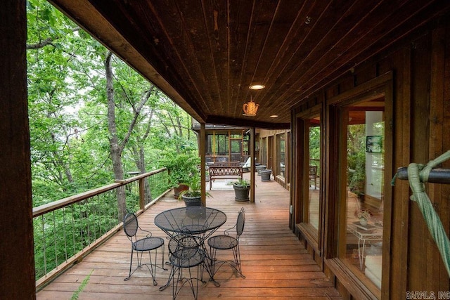 deck with outdoor dining space