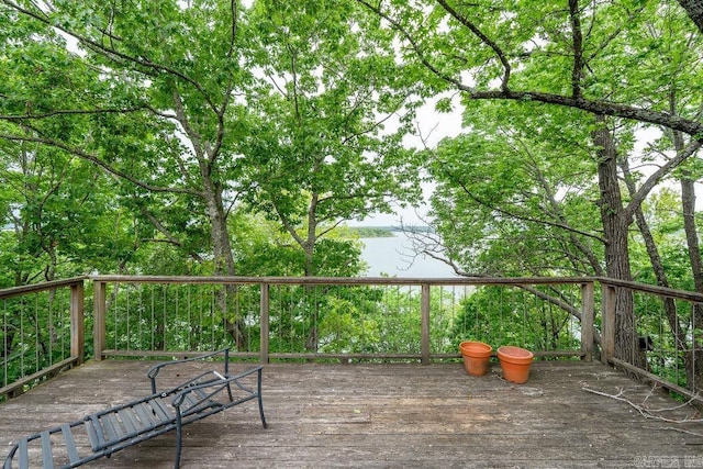 deck featuring a water view