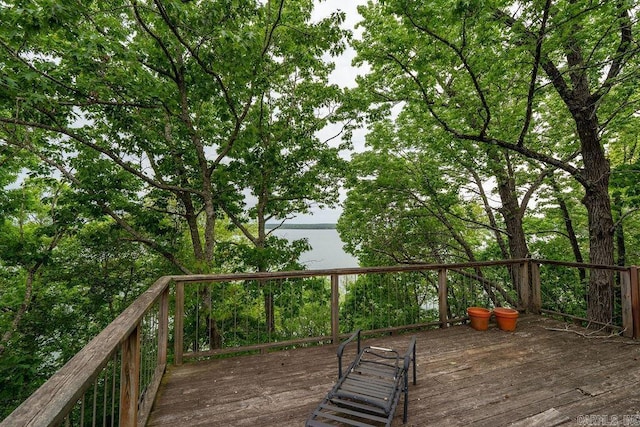 deck featuring a water view