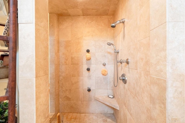 bathroom featuring tiled shower