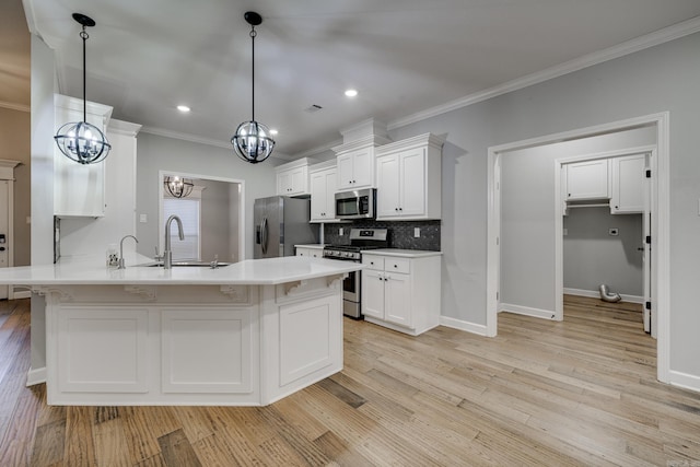 kitchen featuring white cabinets, a notable chandelier, light wood finished floors, light countertops, and stainless steel appliances