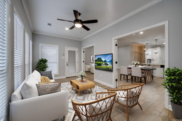 154 Hudson Branch Dr, Austin, AR 72007 - living room with light wood-type flooring, ceiling fan, crown molding, baseboards, and recessed lighting