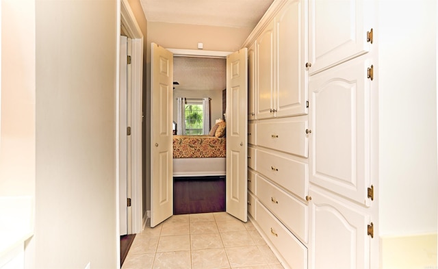 6311 Country Ln, Pine Bluff, AR 71603 - hallway with light tile patterned flooring