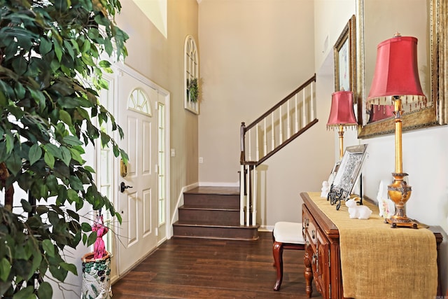 6311 Country Ln, Pine Bluff, AR 71603 - entryway with baseboards, stairs, wood finished floors, and a towering ceiling