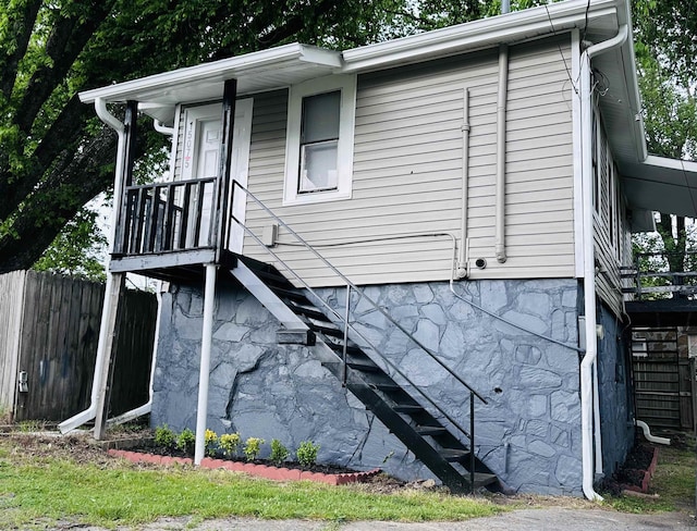 view of side of property with fence