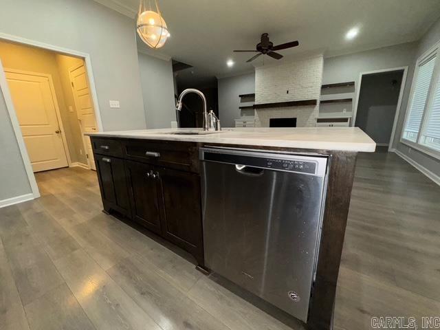 4321 Sloan, Alexander, AR 72002 - kitchen with ceiling fan, stainless steel dishwasher, wood finished floors, a sink, and light countertops