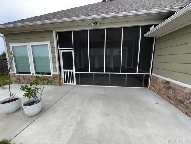 4321 Sloan, Alexander, AR 72002 - view of patio featuring a sunroom