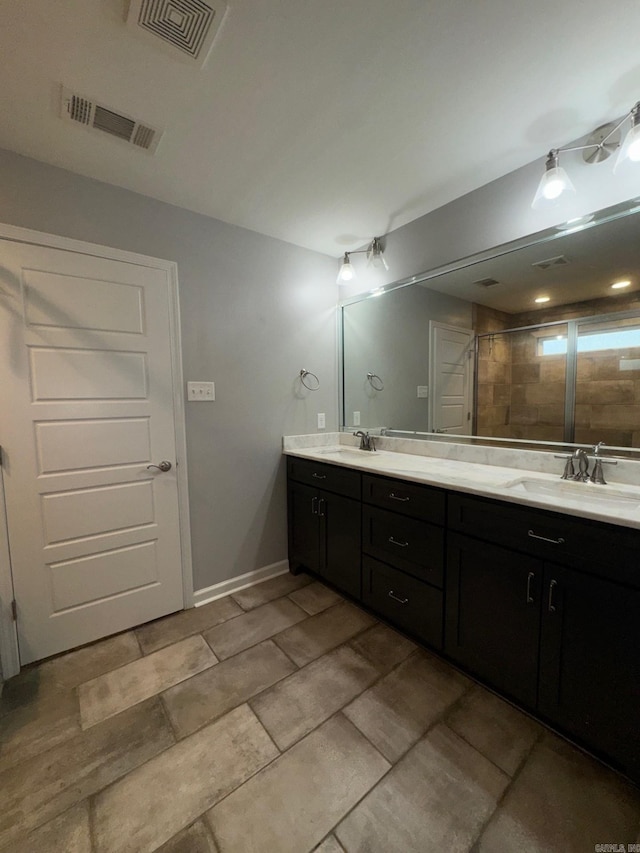 4321 Sloan, Alexander, AR 72002 - full bathroom with visible vents, a sink, and double vanity