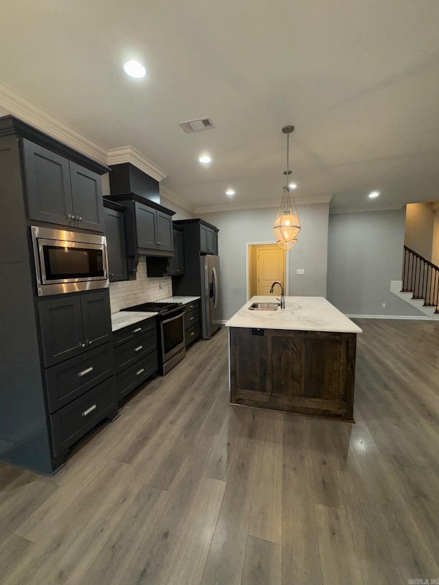 4321 Sloan, Alexander, AR 72002 - kitchen with a sink, crown molding, stainless steel appliances, and wood finished floors
