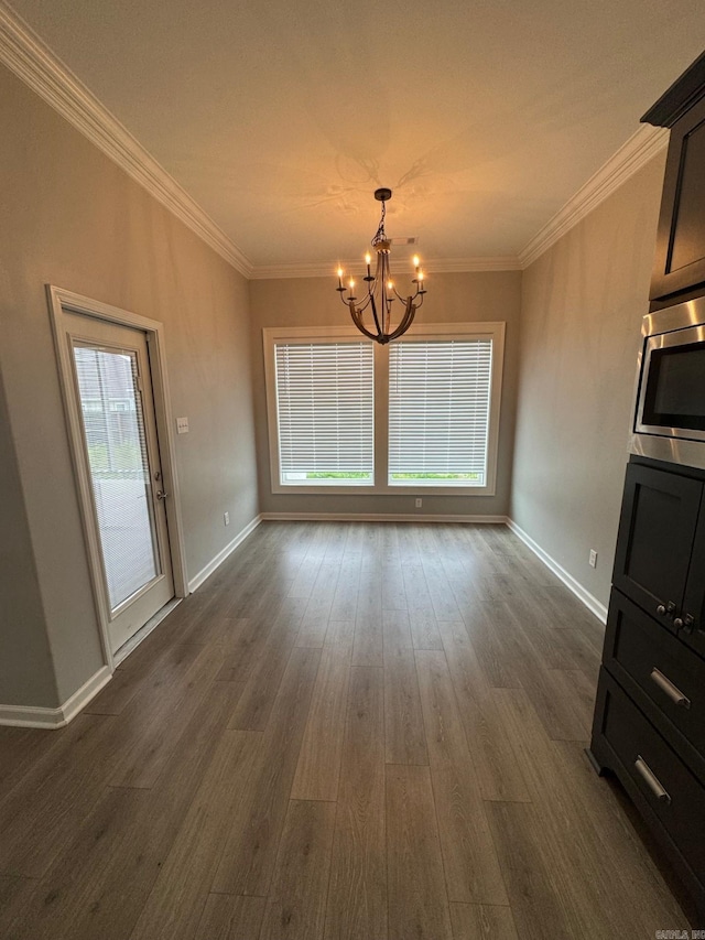 4321 Sloan, Alexander, AR 72002 - unfurnished dining area with crown molding, baseboards, a chandelier, and dark wood-style floors