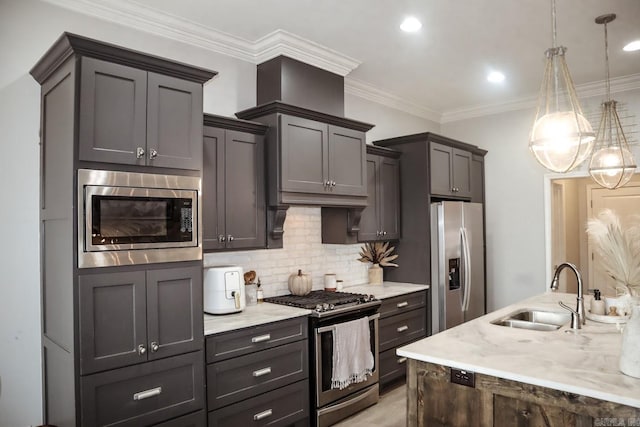 4321 Sloan, Alexander, AR 72002 - kitchen featuring pendant lighting, appliances with stainless steel finishes, tasteful backsplash, a sink, and light stone counters