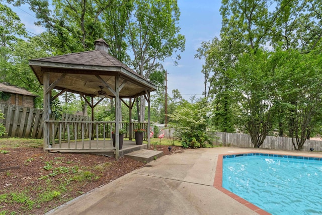 view of pool featuring a patio, a gazebo, a fenced in pool, and a fenced backyard