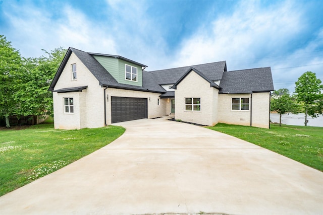 modern inspired farmhouse with an attached garage, driveway, a shingled roof, and a front yard