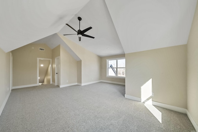 bonus room featuring ceiling fan, vaulted ceiling, baseboards, and carpet