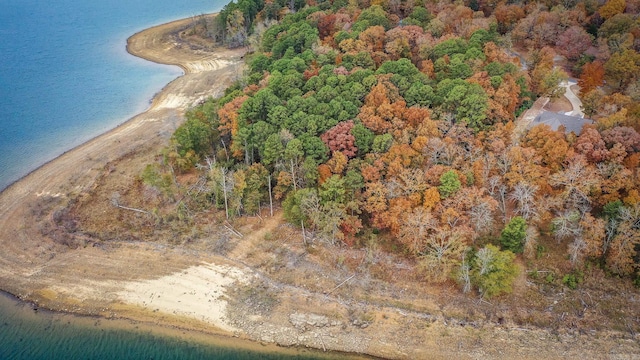 aerial view featuring a water view and a forest view