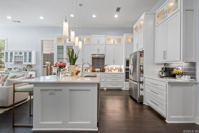702 Wildcreek Cir, Little Rock, AR 72223 - kitchen featuring light countertops, stainless steel appliances, a sink, and tasteful backsplash