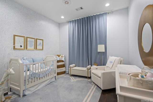 702 Wildcreek Cir, Little Rock, AR 72223 - bedroom featuring a nursery area, wallpapered walls, visible vents, and recessed lighting