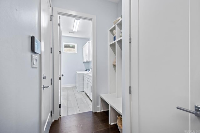 702 Wildcreek Cir, Little Rock, AR 72223 - mudroom with baseboards, washing machine and dryer, and wood finished floors
