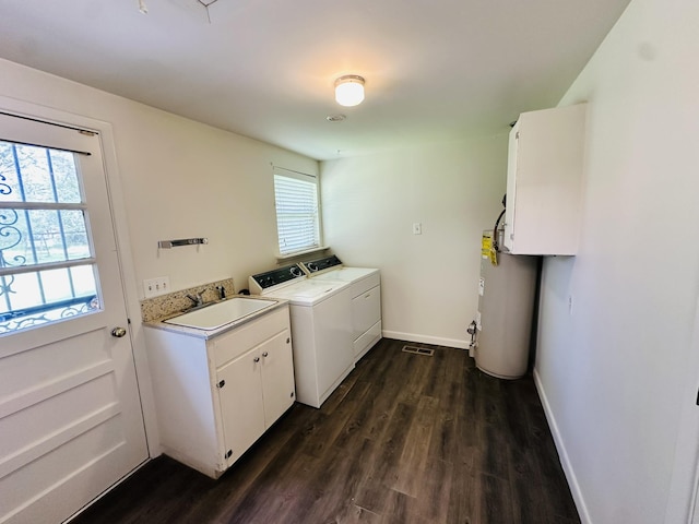 320 Church, Weiner, AR 72479 - laundry area with dark wood-style flooring, washing machine and clothes dryer, cabinet space, a sink, and water heater