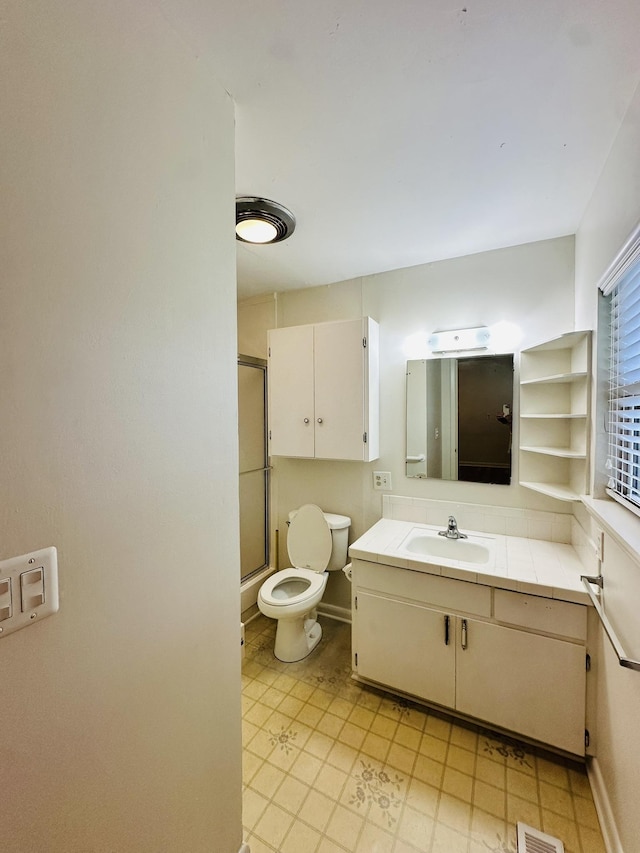 320 Church, Weiner, AR 72479 - full bath with vanity, baseboards, visible vents, and toilet