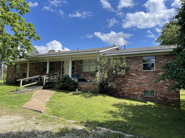 1204 Atkins Unit A & B, Pocahontas, AR 72455 - single story home with a porch, brick siding, and a front lawn
