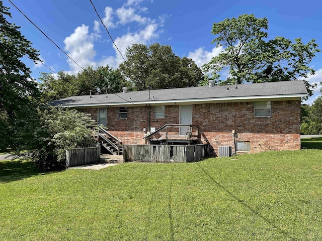 1204 Atkins Unit A & B, Pocahontas, AR 72455 - rear view of property with a lawn, brick siding, cooling unit, and stairs