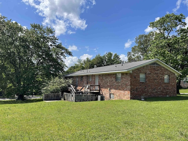 1204 Atkins Unit A & B, Pocahontas, AR 72455 - rear view of house featuring a yard, brick siding, and central air condition unit