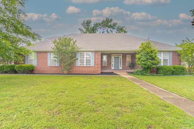 1010 Brownstone Dr, Jonesboro, AR 72404 - ranch-style house with brick siding and a front lawn