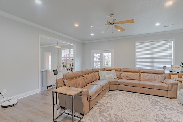 1010 Brownstone Dr, Jonesboro, AR 72404 - living room featuring a ceiling fan, crown molding, baseboards, recessed lighting, and light wood-style flooring