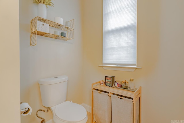 1010 Brownstone Dr, Jonesboro, AR 72404 - bathroom with toilet and baseboards