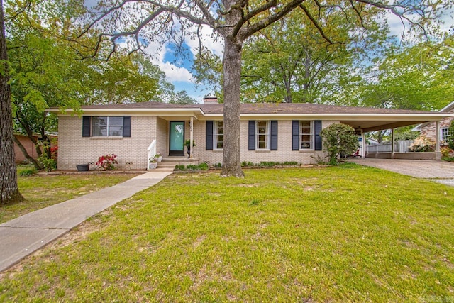 1104 Biscayne Dr, Little Rock, AR 72227 - ranch-style home with brick siding, a front yard, and a carport