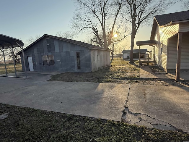 exterior space with concrete driveway