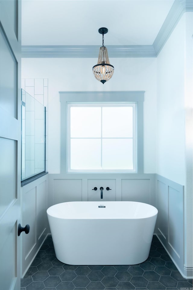 100 Laurie Dr, Mena, AR 71953 - bathroom featuring wainscoting, a decorative wall, and a freestanding tub