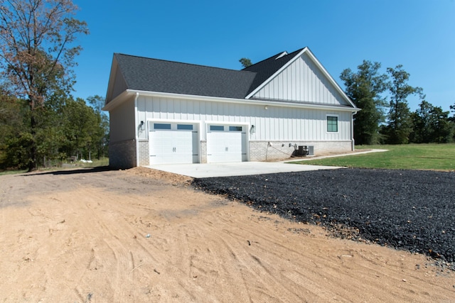 100 Laurie Dr, Mena, AR 71953 - exterior space featuring central AC and concrete driveway