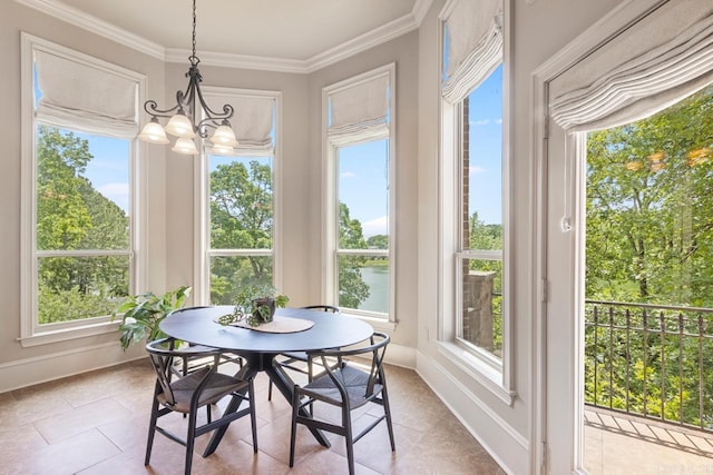 10 Lakewood Park Dr, North Little Rock, AR 72116 - dining space with light tile patterned floors, baseboards, crown molding, and a chandelier