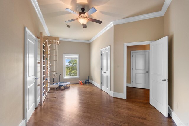 10 Lakewood Park Dr, North Little Rock, AR 72116 - unfurnished room featuring ceiling fan, baseboards, wood finished floors, visible vents, and ornamental molding